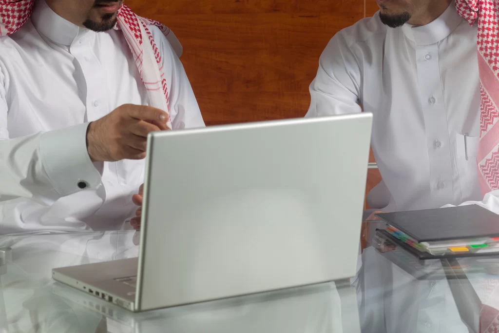 saudi employees work on erp system to manage and automate processesu